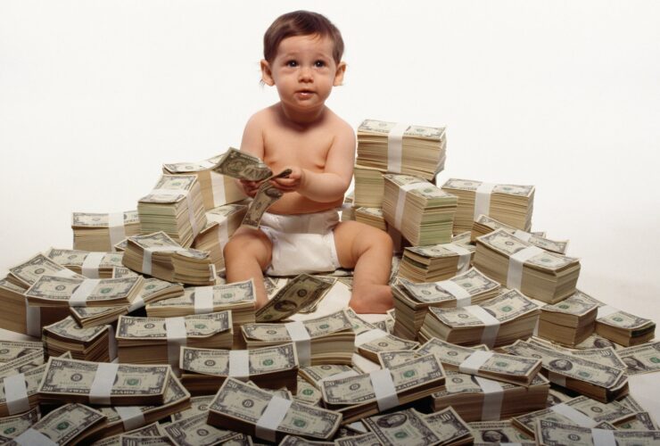 getty-rich-kid-baby-on-money